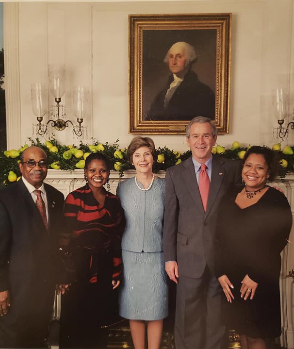 Former White House butler Wilson Roosevelt Jerman with then-President George W. Bush and First Lady Laura Bush.