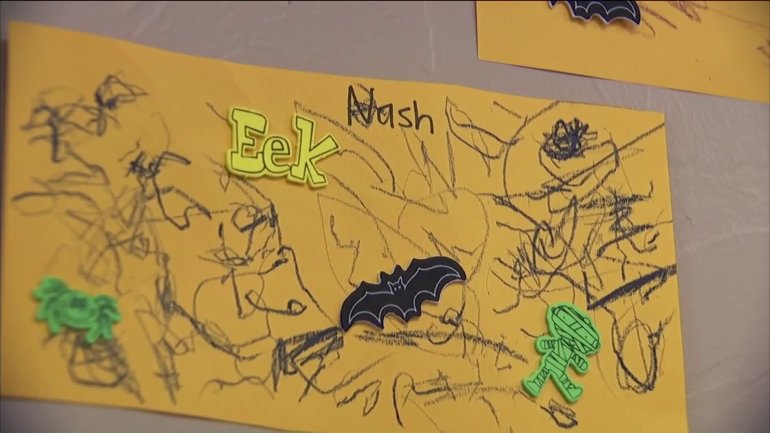 Nash's artwork still hangs on the walls of his classroom.