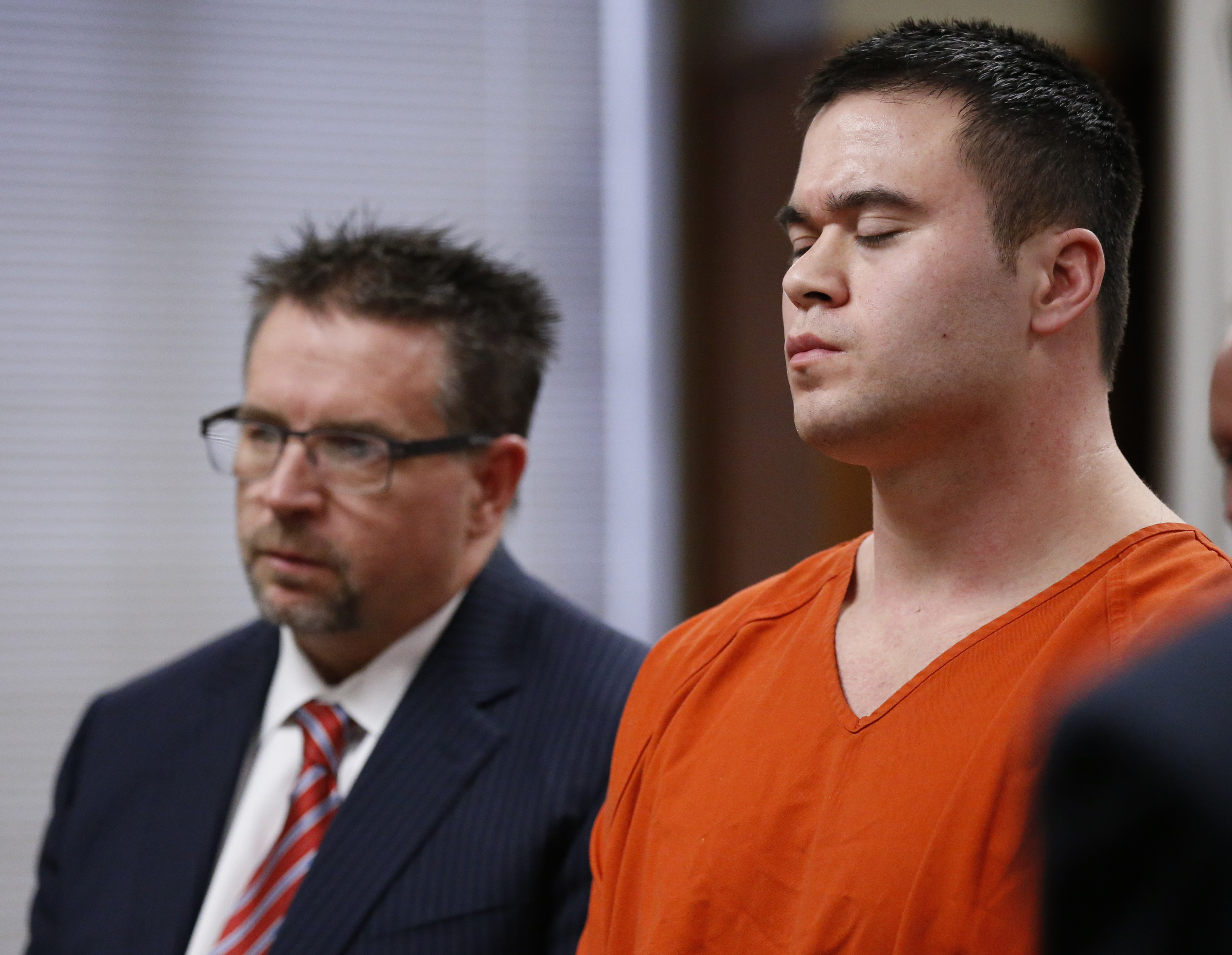 Daniel Holtzclaw, right, and his attorney Scott Adams, left, listen as the judge imposes his sentence during his sentencing in Oklahoma City, Thursday, Jan. 21, 2016. (AP Photo/Sue Ogrocki, Pool)