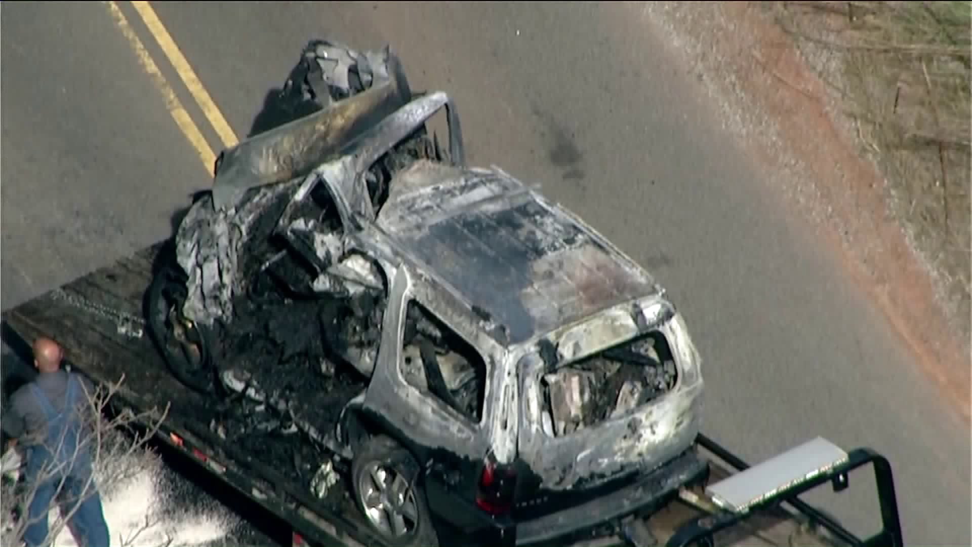 Aubrey McClendon's Chevy Tahoe caught fire after running into an overpass embankment.